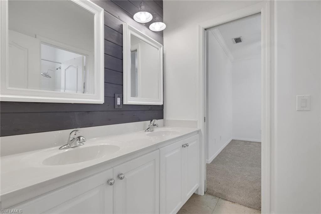 Jack and Jill bathroom accessible by two bedrooms