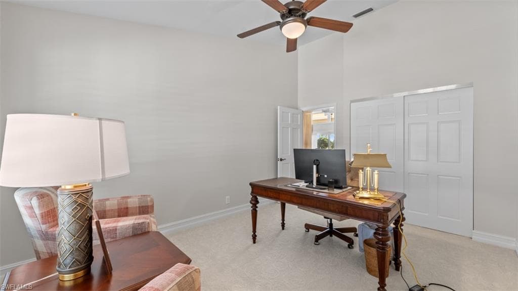 Could be 4th Bedroom, Office or Den, Vaulted ceiling room with light-toned wall paint and neutral carpeting-- with closet for a 4th bedroom