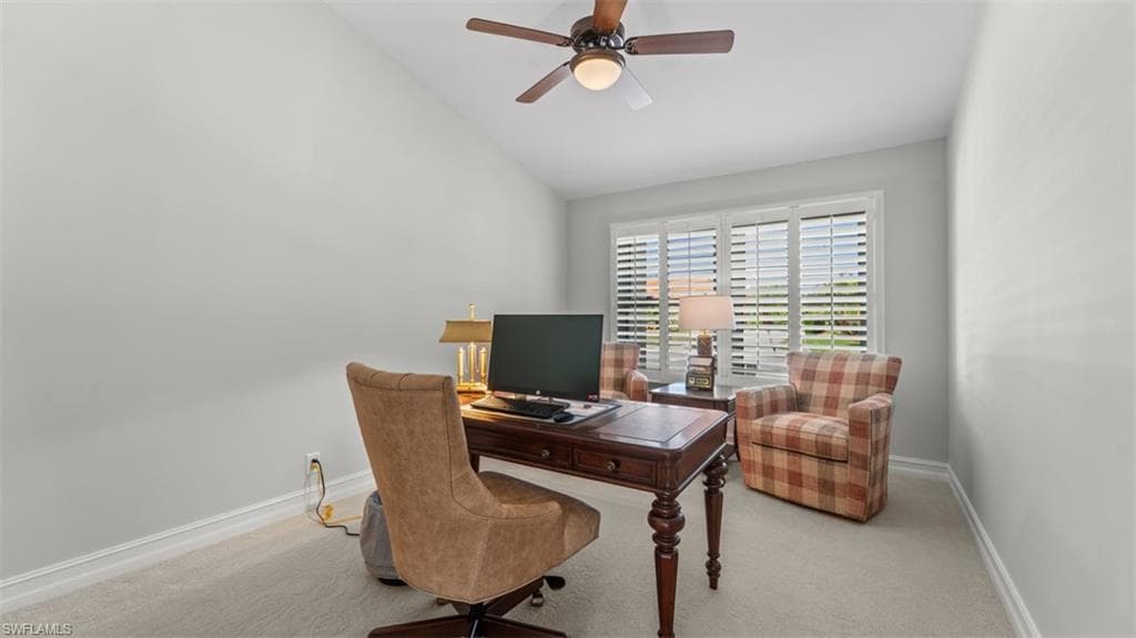 Office or 4th Bedroom, Vaulted ceiling with a ceiling fan, window with plantation shutters, light gray wall color, and white baseboards