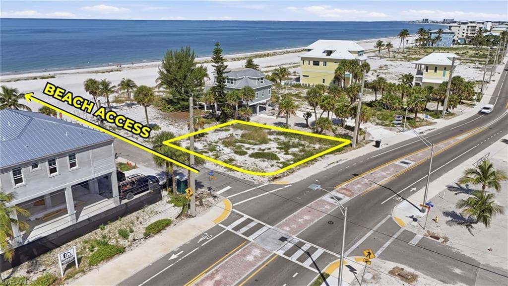 Corner lot offering direct beach access