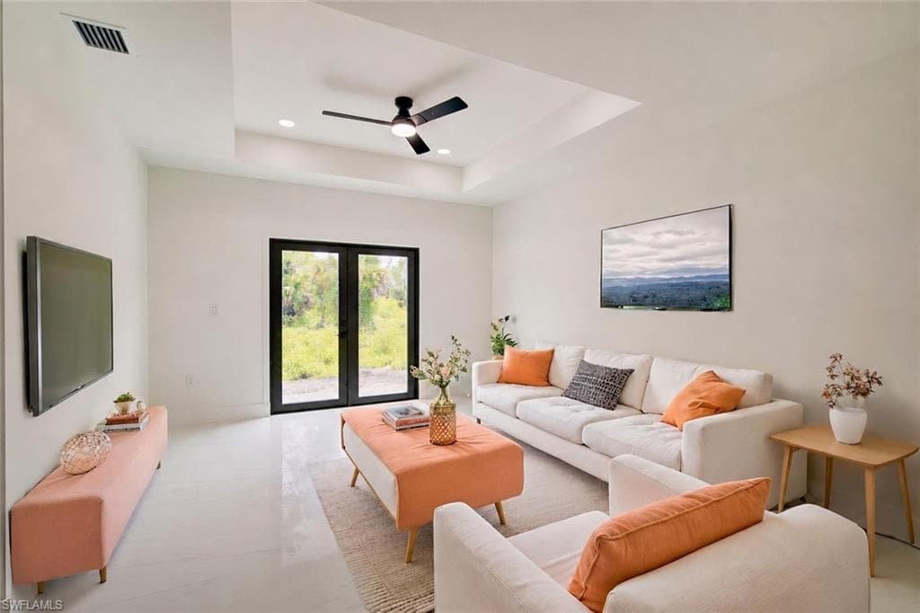 Unit A Photos include virtually enhanced appliances. Range is a front-control model without a rear panel, providing a full view of the backsplash.