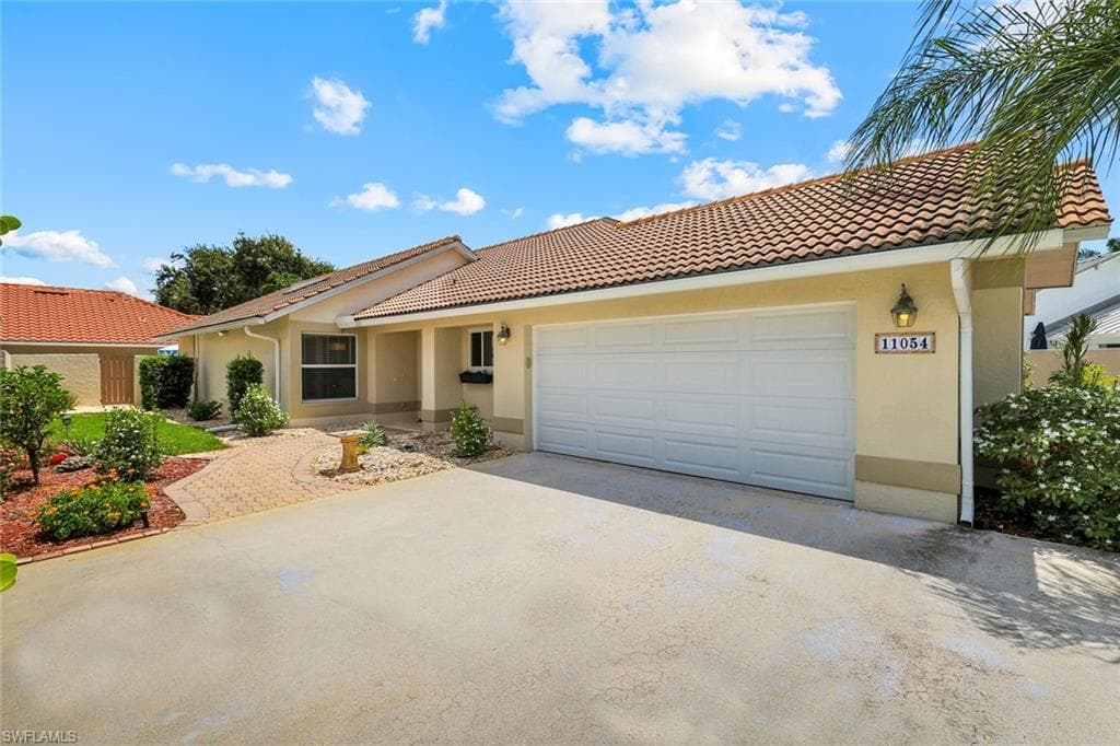 Welcome to this adorable ranch home with private back lanai, extended driveway situated on a private cut-de-sac.