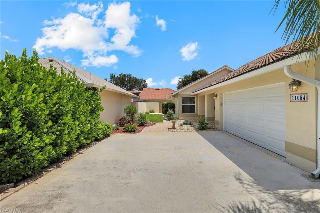 Private front entry with extended driveway
