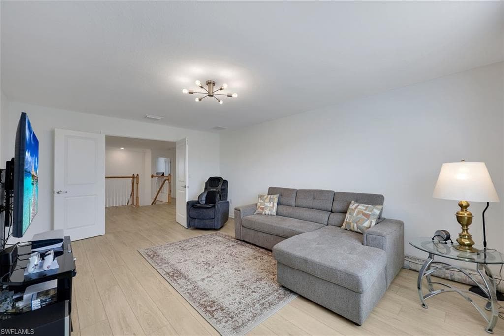 upstairs- large bonus room/den/game room