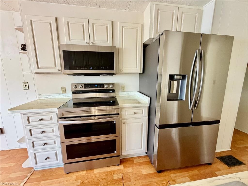 Kitchen with new Samsung appliances