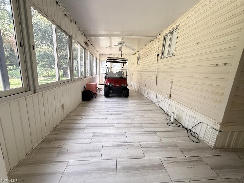 Florida Room w/Sliding Windows overlooking backyard