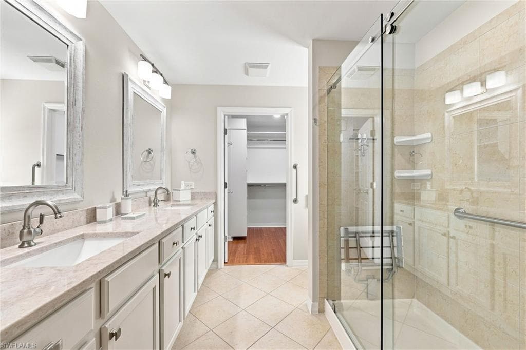 Updated Quartz Countertops, Master Bathroom with Walk-In Shower and also walk in closet