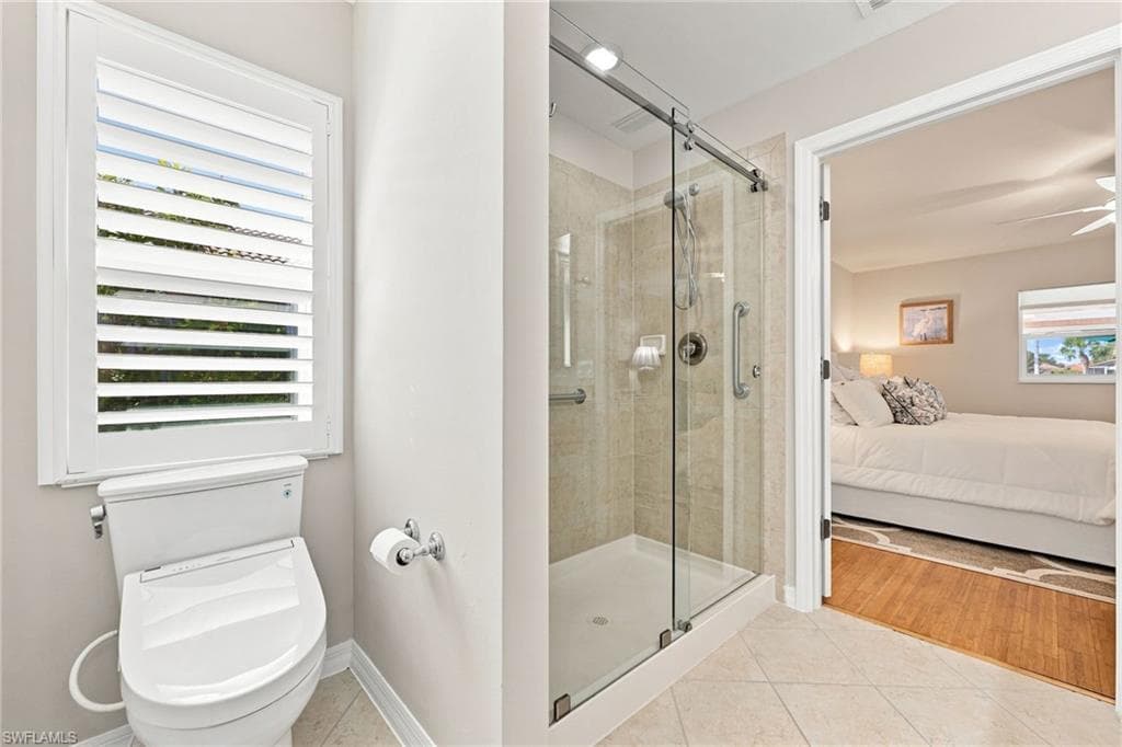 Master Bathroom has custom TOTO toilet , Upgraded glass shower doors.