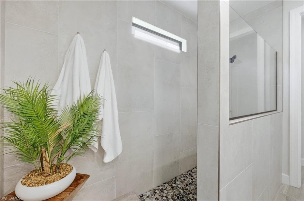Primary Bath Oversized Shower w/stone floor
