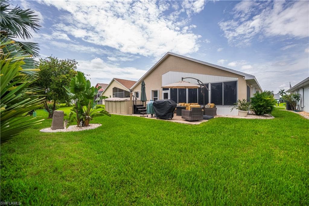 Expansive green lawn with mature landscaping
