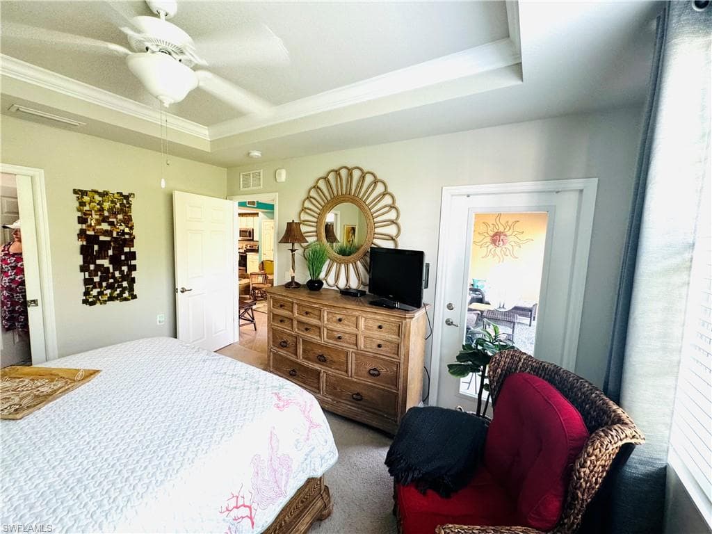 Master bedroom with door to screened lanai