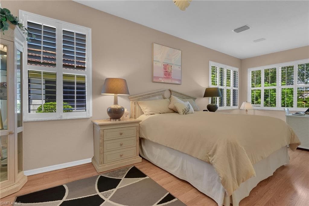 Room featuring light wood-finish flooring and a neutral color palette