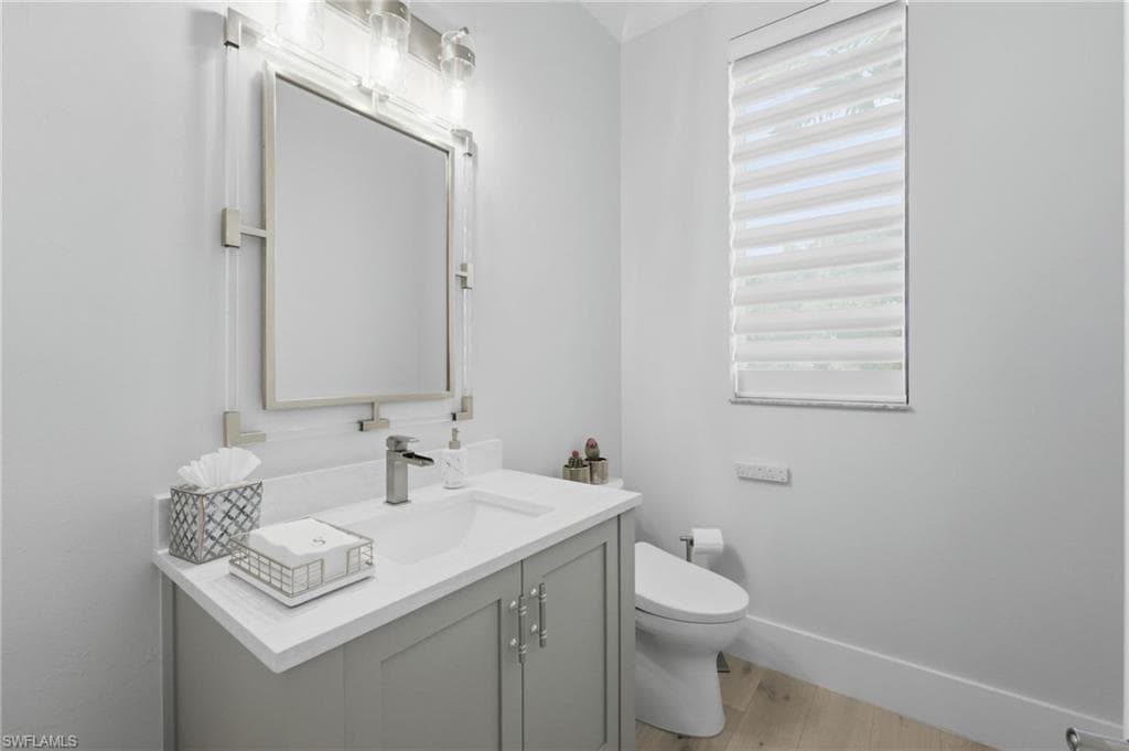An elegant powder bath offers guests a beautifully appointed private retreat, thoughtfully designed with sophisticated finishes and refined details that complement the exceptional character of the estate.