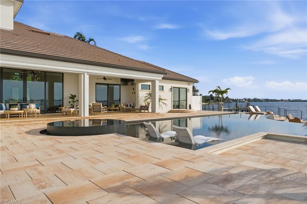 As the centerpiece of the outdoor living space, a spectacular 68,000-gallon, three-sided infinity-edge pool creates the ultimate private resort experience—an extraordinary feature unlike any other in Fort Myers. An eight-person spa completes this unparalleled waterfront retreat, designed for luxurious relaxation and effortless entertaining.