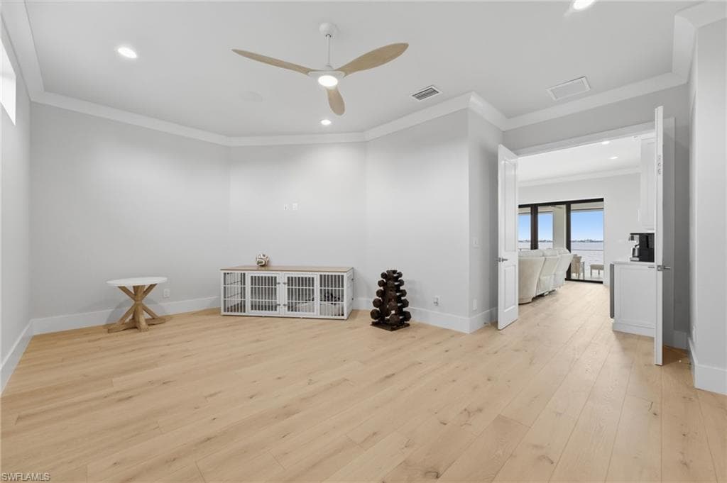 A versatile bonus room on the second level offers endless possibilities, effortlessly adapting to your lifestyle as a private fitness studio, sophisticated home office, intimate theater, creative studio, or inviting playroom—an exceptional space limited only by your imagination.