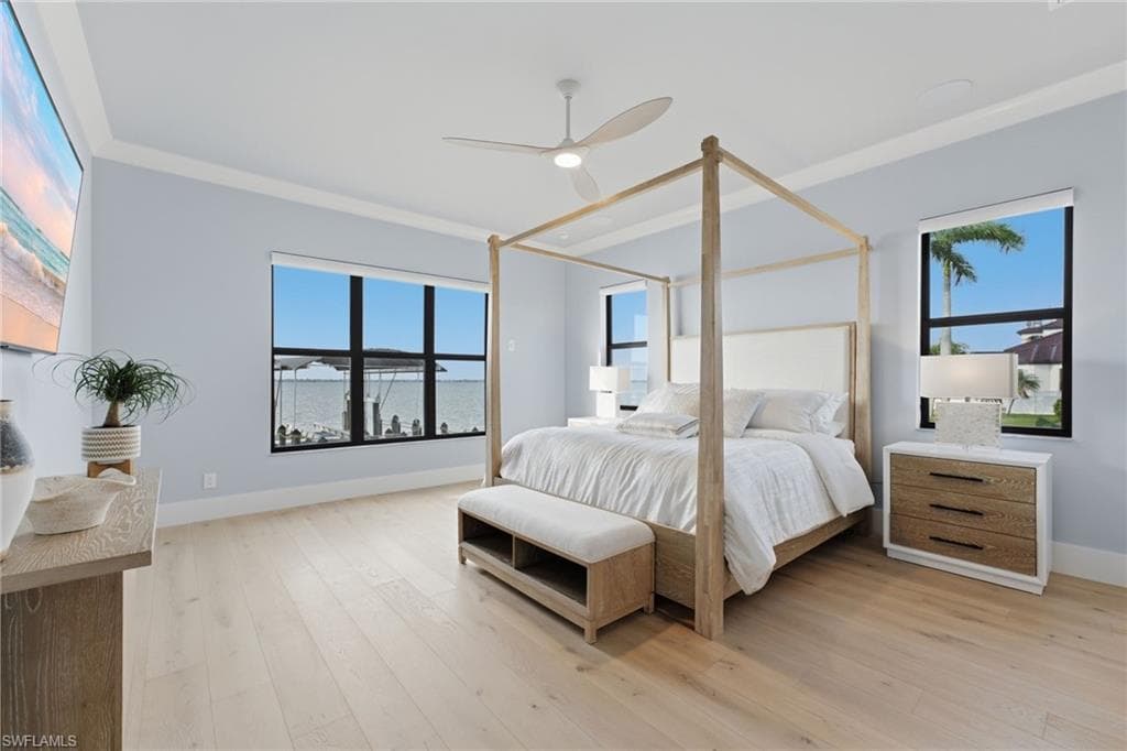 The fifth bedroom offers a luxurious second primary suite, privately situated on the main level and thoughtfully designed to mirror the elegance and comfort of the upstairs primary retreat. Featuring a spacious bedroom, luxurious ensuite bath, and walk-in closets, it provides an exceptional private sanctuary for family or guests.