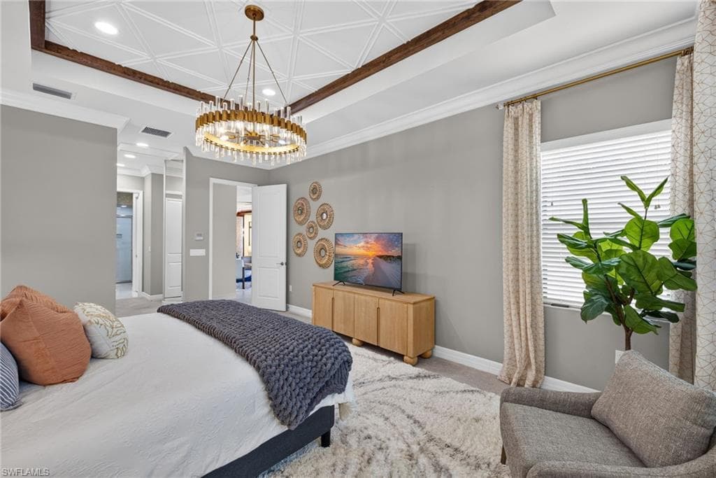 Tray ceiling with decorative ceiling tiles and exposed wood beams