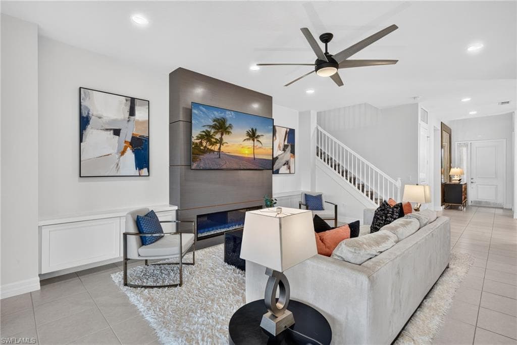 Contemporary living space with a built-in fireplace feature wall