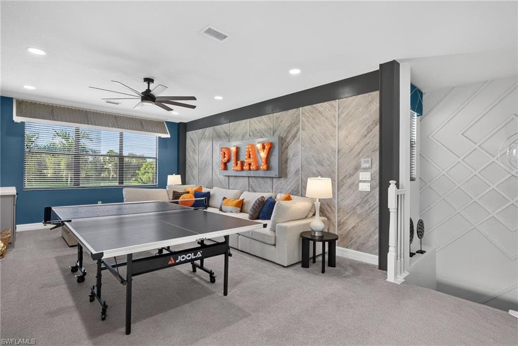 Recessed lighting, ceiling fan, and wall-mounted decorative paneling