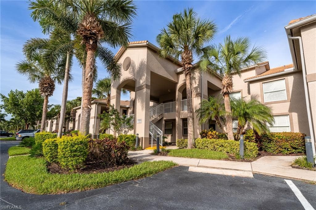 Building 19980, Condo is on 2nd floor on left. Covered entry stairs and there is a nice front porch area. Loads of guest and overflow parking.