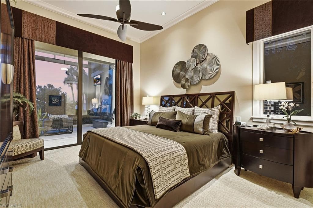 The second bedroom offers the flexibility of a private second primary suite, featuring direct access to the lanai and breathtaking river views. Wake each morning to serene waterfront vistas while enjoying the seamless connection to the outdoor living spaces.
