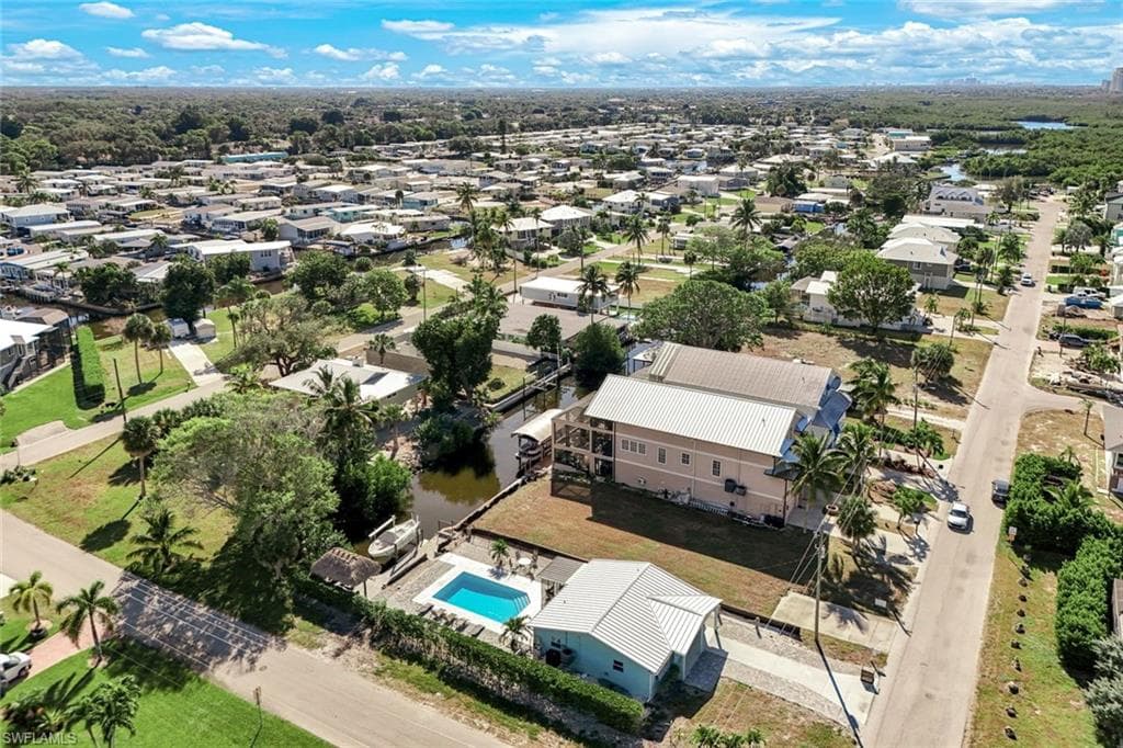 Aerial view of residential area with a pool