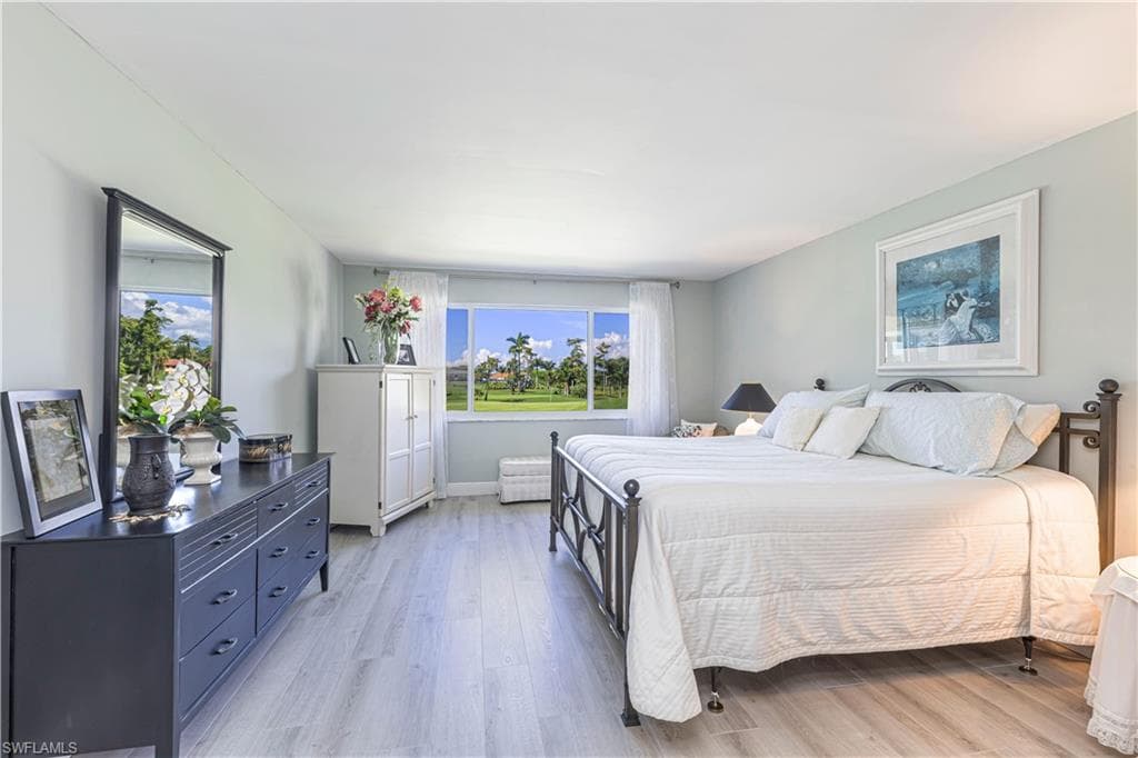Bedroom with light wood-type flooring