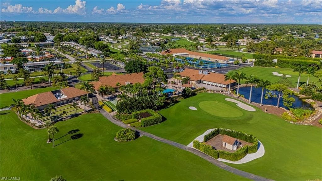 Bird's eye view of a large body of water and a local golf course