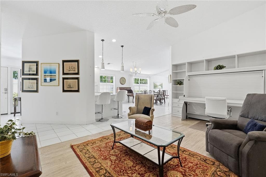 Family room which currently has a desk/murphy bed in for extra visitors if needed