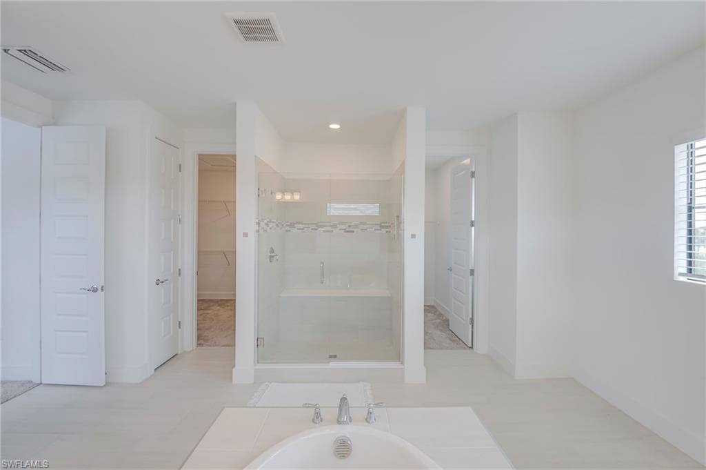 2 closets in primary bathroom