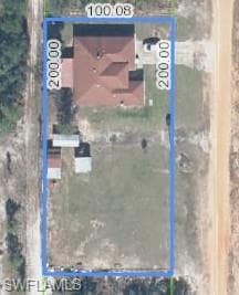 Aerial View with Property Boundary. Displaying the property's perimeter and associated dimensions