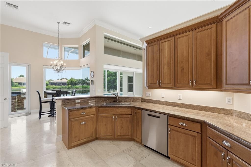This airy kitchen serves as the heart of the home, offering an easy connection to the living area.