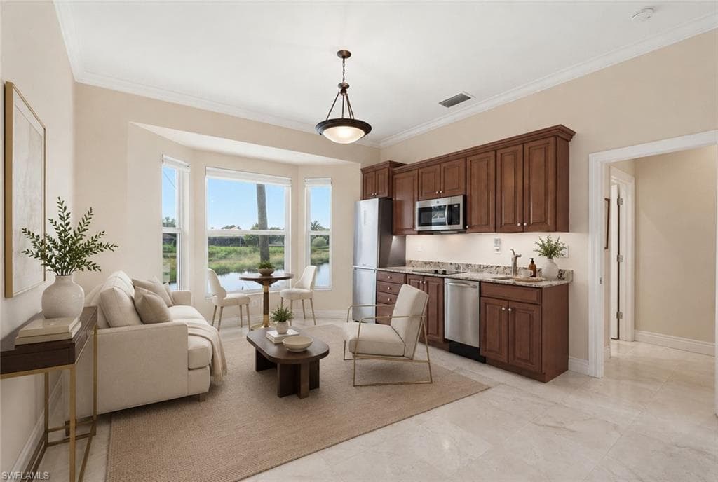 Notice the kitchenette complete with all appliances.
