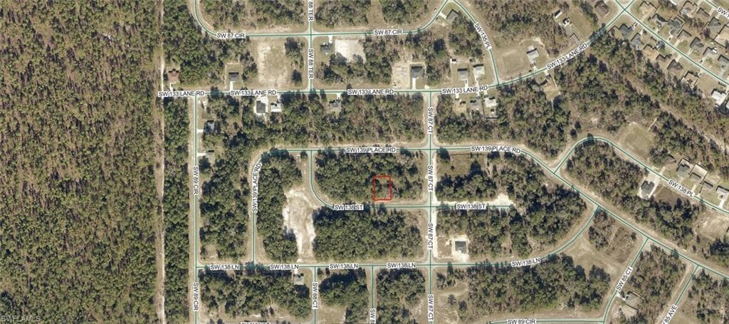 Aerial Map. Indicating the location of the property within a network of roads and land parcels