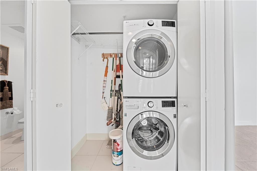 Full size washer & dyer in hallway