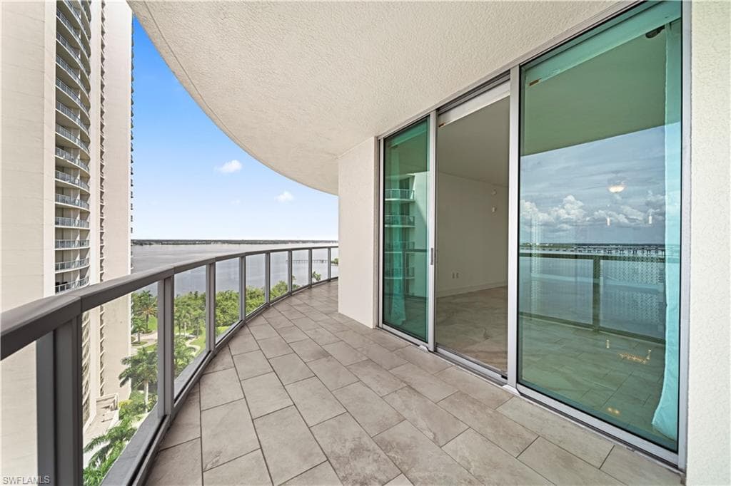 Tiled Lanai off Living Room w/Water Views!