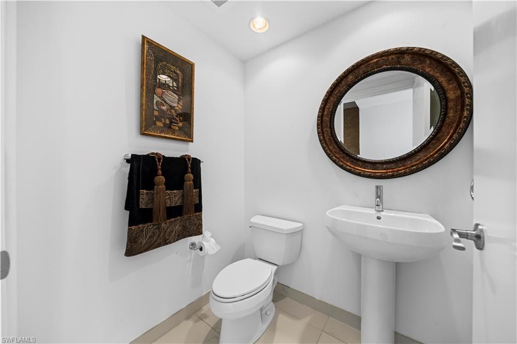 Hallway 1/2 bathroom w/Marble Tiled Floors