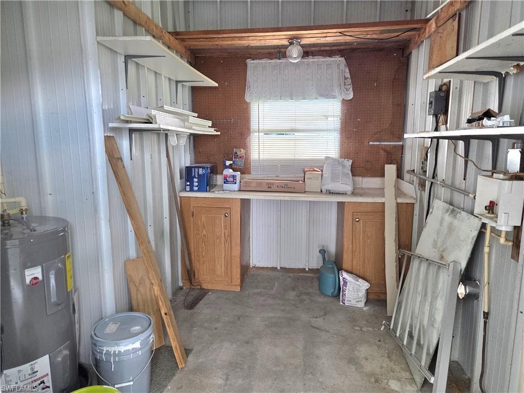 Shed provides extra storage and houses a 30-gallon water heater (new in 2024).