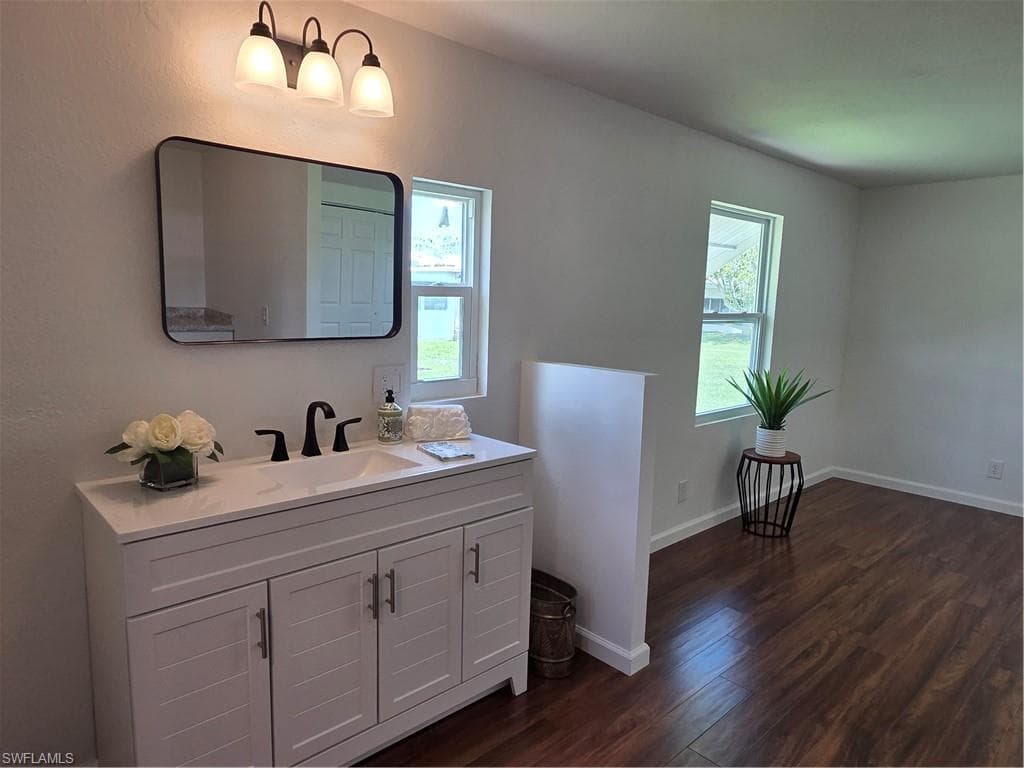 BRAND NEW vanity, faucet, & mirror in the Primary suite.