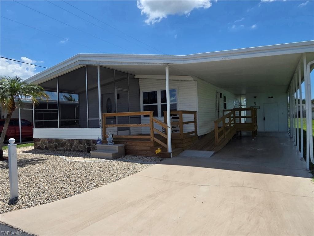 Screened-in porch & covered patio, plus a covered carport with convenient handicap ramp.