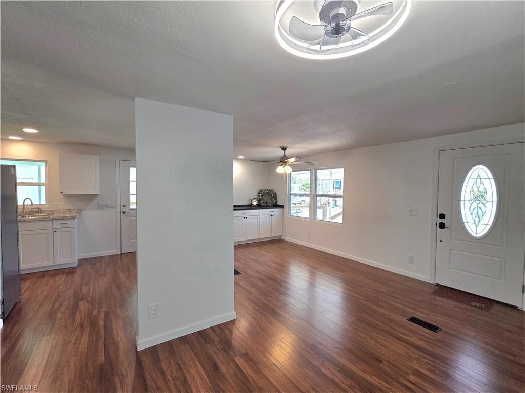 Lustrous engineered wood flooring throughout 1100+ sf of air-conditioned living space READY for YOU to move in!