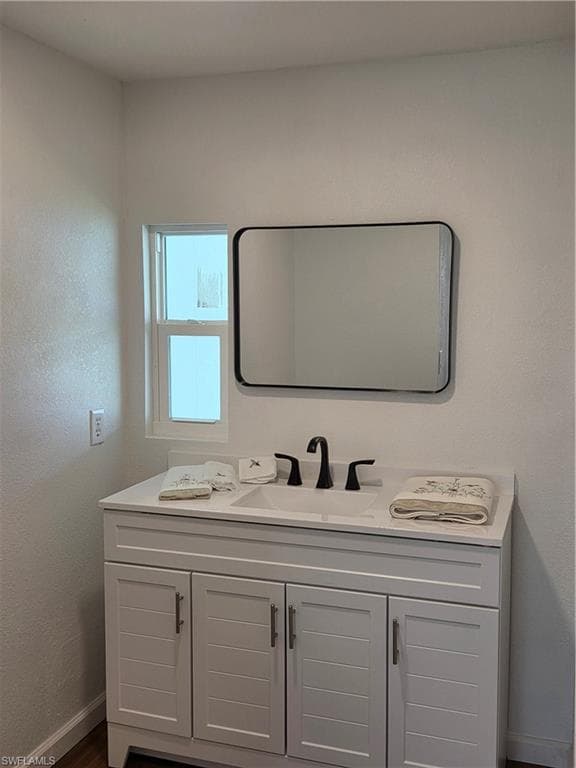 New cabinet and mirror in the guest bath.