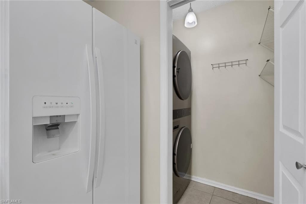 Laundry right off kitchen with closed doors