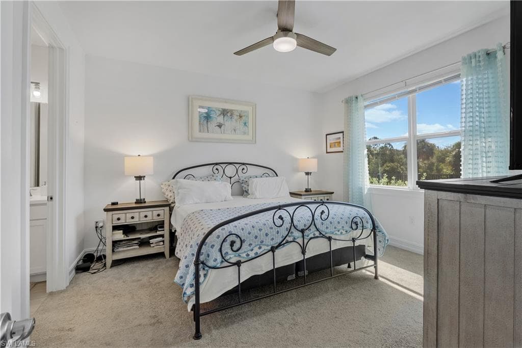 Recessed lighting, ceiling fan with integrated light, bright window with natural light, and permanent built-in cabinetry