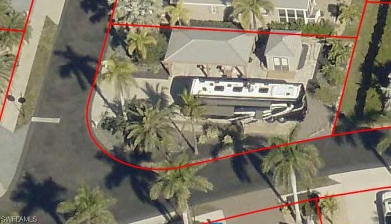 Aerial overview of property's location featuring property parcel outlined