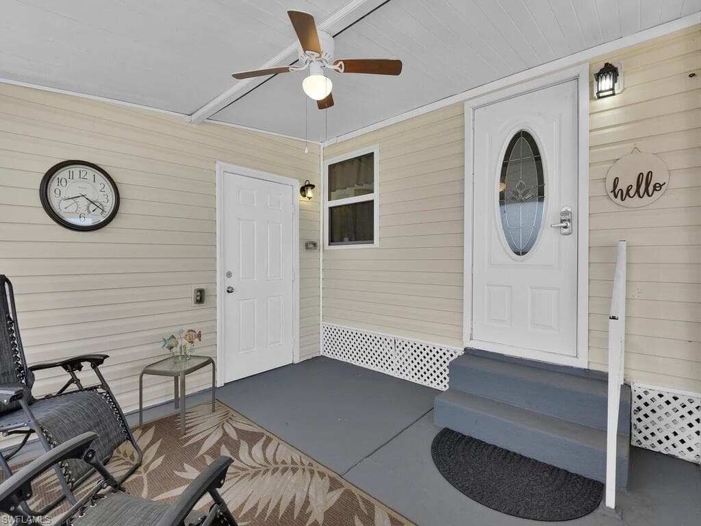 screened front entry with storage shed