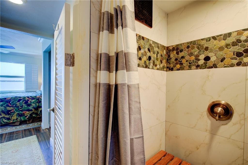 Master bathroom with an easy access stand-up shower for the utmost in safety & convenience
