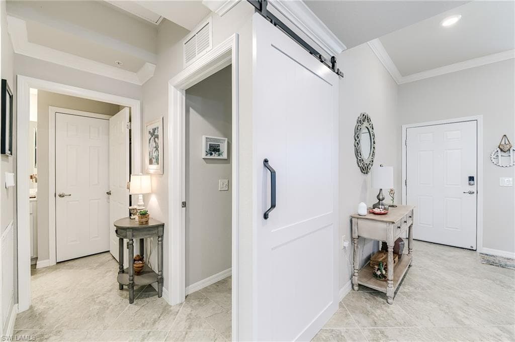 Hallway to the guest bedroom, bathroom, and laundry.