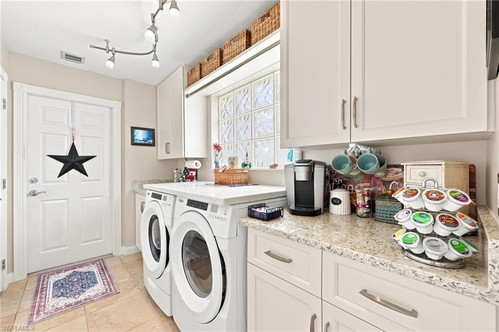 Updated laundry room with newer washer and dryer