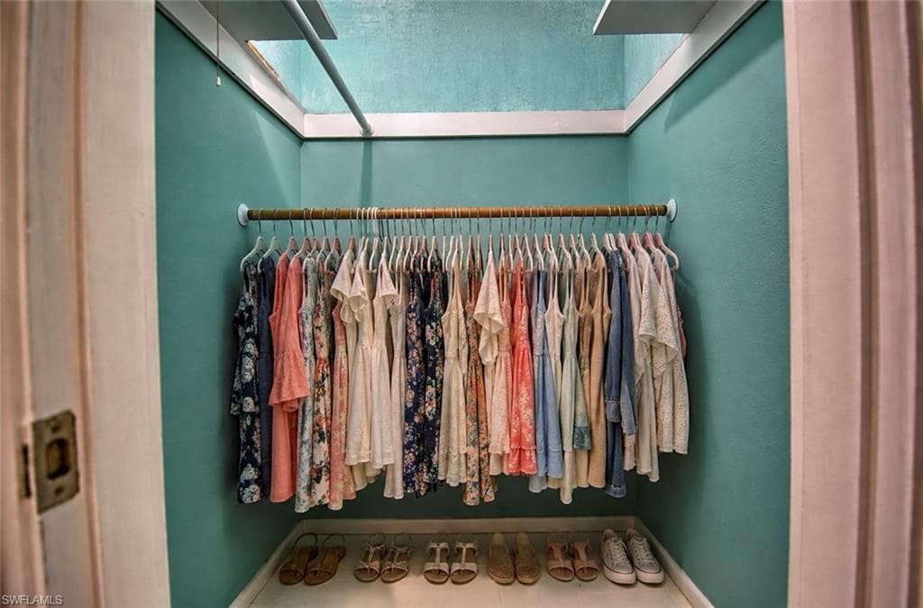 Walk-in closet in primary bedroom